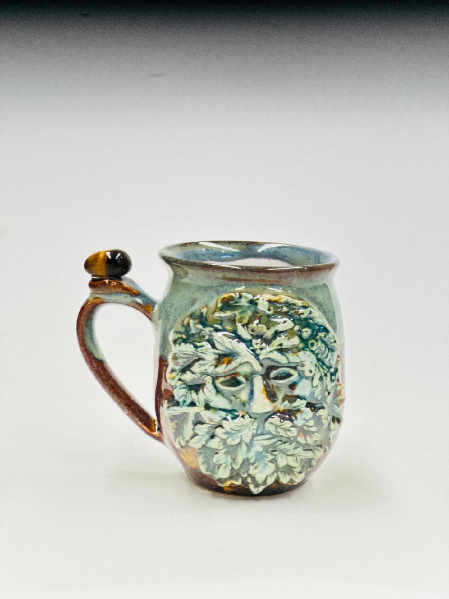 Green Man Tigers Eye Crystal Mug