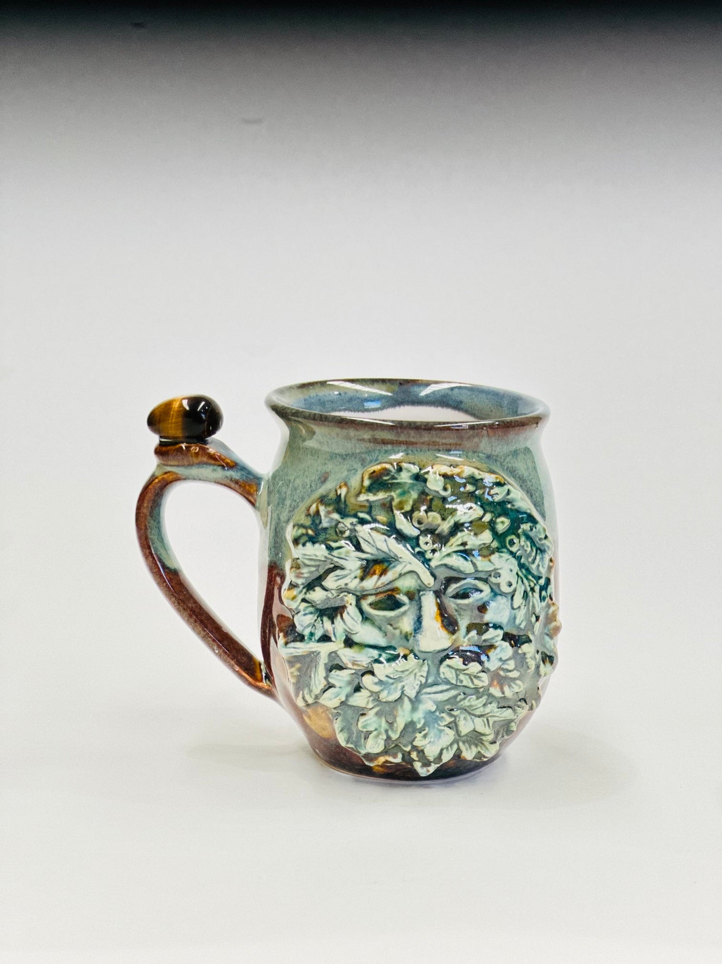 Green Man Tigers Eye Crystal Mug